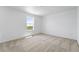 Cozy bedroom with neutral carpet, and bright natural light at 17123 W 91St Ln, Arvada, CO 80007