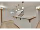 Finished basement featuring a bar area, carpeted floor, and modern lighting at 5722 W Chestnut Ave, Littleton, CO 80128