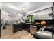 A view of the kitchen, showcasing countertops, stainless steel cabinets, and eat in dining at 7234 S Kendall Ct, Littleton, CO 80128