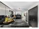 Bright and open kitchen with stainless steel appliances and black tiled countertops at 7234 S Kendall Ct, Littleton, CO 80128