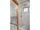 Updated bathroom featuring a walk-in shower and granite vanity at 14370 Osage St, Westminster, CO 80023