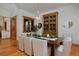 Elegant dining room with hardwood floors, modern pendant lighting, and stylish furnishings for Gathering gatherings at 14370 Osage St, Westminster, CO 80023
