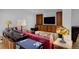 Basement living area with entertainment center and comfortable seating at 14370 Osage St, Westminster, CO 80023