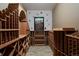 Beautiful wine cellar with custom wood racking and brick flooring at 14370 Osage St, Westminster, CO 80023