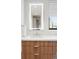 This bright bathroom includes a modern vanity with a framed LED mirror and modern fixtures at 2160 Folsom St, Boulder, CO 80302