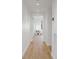 Bright hallway leads to open and airy living area with natural light, perfect for modern living at 2160 Folsom St, Boulder, CO 80302