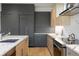 Spacious kitchen featuring sleek cabinetry, modern appliances, and marble countertops at 2160 Folsom St, Boulder, CO 80302