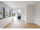 Bright and airy living room features large windows, hardwood floors, and ample natural light at 2160 Folsom St, Boulder, CO 80302