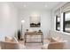 Home office boasts clean lines, bright natural light, and a modern desk and seating arrangement at 2160 Folsom St, Boulder, CO 80302