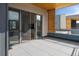 Modern rooftop deck with outdoor access via sliding glass doors and wood slat accents at 2160 Folsom St, Boulder, CO 80302