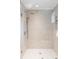 Glass-enclosed shower with neutral tile and modern fixtures at 2160 Folsom St, Boulder, CO 80302