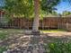 Backyard with a small barbecue station and a charming stone garden feature at 14050 E 25Th Pl, Aurora, CO 80011