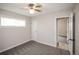 Cozy bedroom with carpet, a ceiling fan, and neutral walls, providing a serene and inviting atmosphere at 2696 S Grove St, Denver, CO 80219
