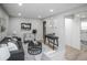 Bright living room with neutral walls, recessed lights and stylish decor at 2696 S Grove St, Denver, CO 80219