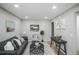 Comfortable living room featuring ample seating and stylish furnishings at 2696 S Grove St, Denver, CO 80219