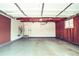 Spacious two-car garage with ample storage and access to the home's interior at 4854 S Parfet St, Littleton, CO 80127