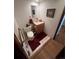 Cozy half-bathroom with a pedestal sink, tiled floors, and wood accents for a touch of elegance at 14131 E Baltic Pl, Aurora, CO 80014