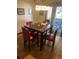 Inviting dining area with hardwood floors and a chandelier, perfect for Gathering meals and entertaining at 14131 E Baltic Pl, Aurora, CO 80014