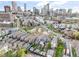 Stunning aerial view of residential neighborhood with the cityscape in the backdrop at daytime at 2244 N Washington St, Denver, CO 80205