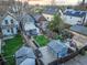 Backyard aerial shot displaying outdoor patio, garden, shed, and green lawn at 2244 N Washington St, Denver, CO 80205
