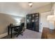 This office has dark wood-trimmed black bookcases and a black desk at 2244 N Washington St, Denver, CO 80205