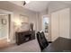 This bright, comfortable home office has a large window and ample storage at 2244 N Washington St, Denver, CO 80205