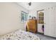Bright bedroom with a ceiling fan, cozy bed and natural light at 7940 Pontiac St, Commerce City, CO 80022