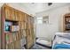 Bedroom featuring large record collection, ceiling fan and bright, natural light at 7940 Pontiac St, Commerce City, CO 80022