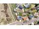 Birds eye view shows neighboring homes and ample space on the lot with easy access to streets and neighborhood amenities at 6376 S Estes St, Littleton, CO 80123