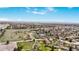 Expansive aerial view of the neighborhood showcases the community layout and proximity to major roadways and green spaces at 6376 S Estes St, Littleton, CO 80123