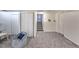 Finished basement with storage and access to upper levels at 6376 S Estes St, Littleton, CO 80123