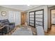 Versatile room with multiple closets and seating, perfect for relaxation at 6376 S Estes St, Littleton, CO 80123