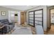 Versatile room with multiple closets and seating, perfect for relaxation at 6376 S Estes St, Littleton, CO 80123