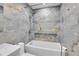 Contemporary bathroom featuring unique blue marble tiles and modern bath fixtures at 4678 S Salida St, Aurora, CO 80015