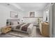 Bedroom with carpet, neutral decor, and large window at 4678 S Salida St, Aurora, CO 80015