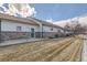 Spacious backyard with potential for outdoor activities, and featuring partial fencing for added privacy at 2585 E Egbert St, Brighton, CO 80601