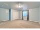 Comfortable bedroom featuring a window with stylish curtains and a built-in closet at 2585 E Egbert St, Brighton, CO 80601