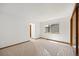 Bedroom with neutral carpet and a large window at 1829 S Pitkin Cir, Aurora, CO 80017