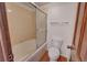 Bathroom features a tub/shower combination with sliding glass doors and a towel rack at 2713 W Long Dr # C, Littleton, CO 80120