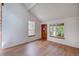 Inviting living room with hardwood floors, large windows, and plenty of space at 2713 W Long Dr # C, Littleton, CO 80120