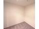 Unfinished area with neutral carpeting and white walls at 2713 W Long Dr # C, Littleton, CO 80120