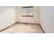 Bedroom with neutral carpet and a window at 1011 Thames St, Highlands Ranch, CO 80126