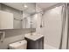 Modern bathroom with a shower and vanity at 3016 S Grape Way, Denver, CO 80222
