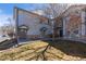 Complex exterior view shows building entrances, each with stone accents and well-kept lawn at 3260 E 103Rd Pl # 912, Thornton, CO 80229