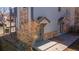 Charming exterior featuring a covered entryway and lovely stone accents at 3260 E 103Rd Pl # 912, Thornton, CO 80229