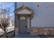 Charming front door features stone accents and a sidelight window at 3260 E 103Rd Pl # 912, Thornton, CO 80229
