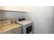 Functional laundry room with a dryer and plenty of space at 3260 E 103Rd Pl # 912, Thornton, CO 80229
