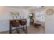 Cozy dining nook with comfortable seating and ample natural light, creating a welcoming spot to relax and unwind at 3260 E 103Rd Pl # 912, Thornton, CO 80229
