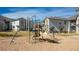 Community playground featuring modern play equipment and manicured landscaping at 3260 E 103Rd Pl # 912, Thornton, CO 80229