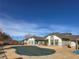 Community pool with covered tarp, perfect for swimming laps or relaxing poolside at 3260 E 103Rd Pl # 912, Thornton, CO 80229